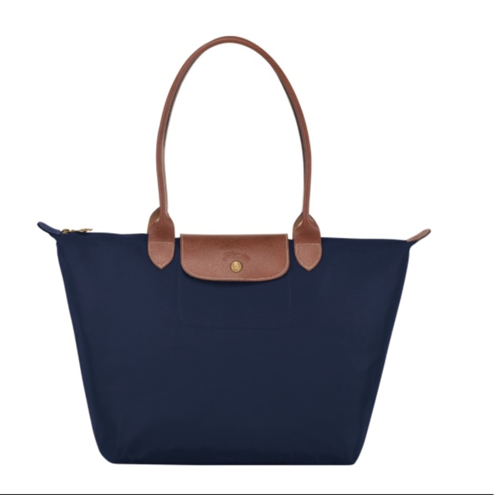Longchamp “Le Pliage” foldable tote bag.